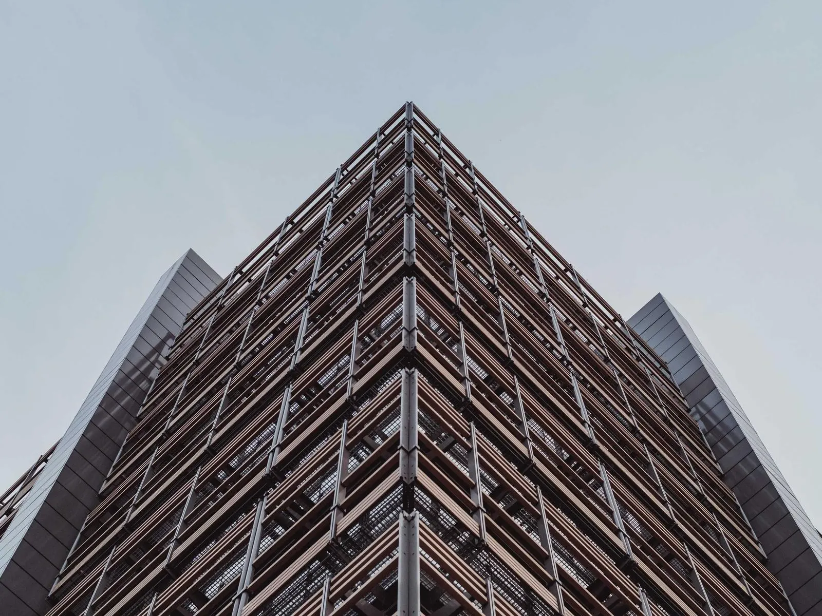 Steel lattice corner of a tower photographed from below